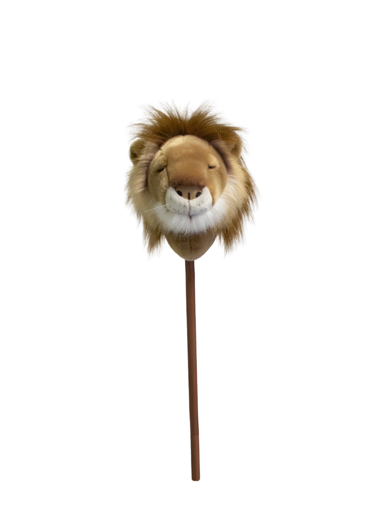 The Hobbyhorse - Lion features a plush lion head on a brown stick, resembling a classic toy hobby horse—ideal for safari-themed play. Shown against a plain white backdrop.