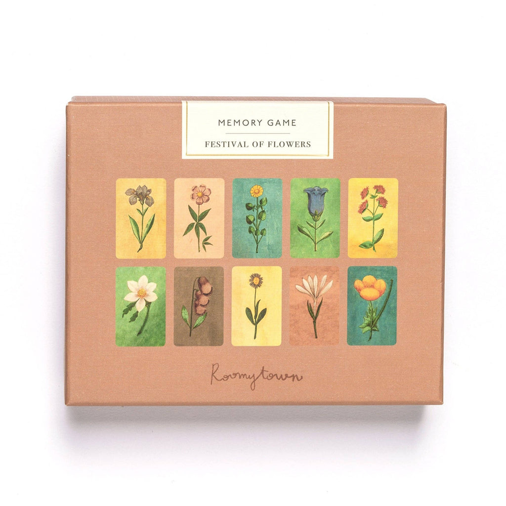 A box labeled "Memory Game - Festival of Flowers" displays watercolor illustrations of ten different flowers on the lid, each with a colored background, and "Roomytown" appears at the bottom.