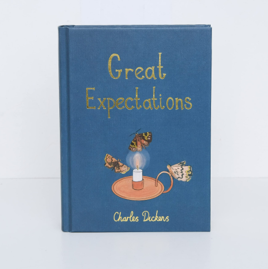 The "Great Expectations | Collector's Edition | Hardcover" features a blue cover with an illustration of a lit candle surrounded by fluttering moths.