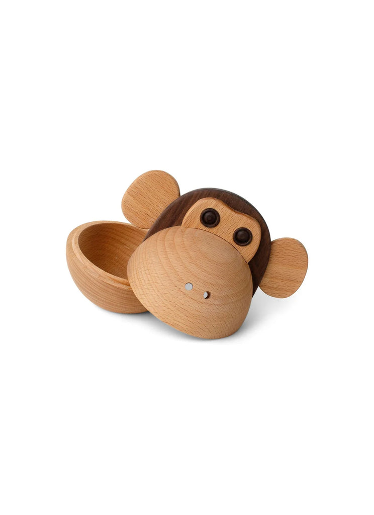 A Spring Copenhagen The Monkey Bowl designed by Mencke&Vagnby, featuring a monkey-shaped container with a removable head that serves as the lid, set against a clean, white background.