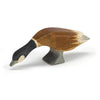 The Ostheimer Goose - Canada, Long Neck is a handcrafted wooden figurine with brown, black, and white details in a grazing pose—ideal for fans of sustainable wooden toys or Ostheimer collectibles.