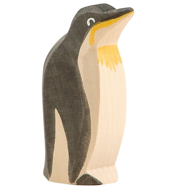 The Ostheimer Penguin - Head High is a handcrafted wooden toy that stands upright. It is painted in shades of gray, black, and white, featuring a yellow accent around the neck to resemble an emperor penguin. Its simplistic design with smooth edges and minimal detail makes it perfect for encouraging imaginative play in children.