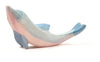 The Ostheimer Dolphin, Head High is a handcrafted wooden figurine inspired by Ostheimer toys. Painted in soft pastel shades of blue, pink, and white, this dolphin is depicted mid-leap with its head up and tail curved. Made from sustainably sourced materials, it stands out beautifully against a plain white background.