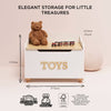 The Toy Storage Box is a white FSC wood toy chest with "TOYS" on the front, topped by a teddy bear and toy train. Hand-crafted for sustainability, it measures 675mm wide, 530mm tall, and 425mm deep—perfect eco-friendly kids' storage.