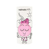 A container of Nailmatic Dolly kids nail polish featuring a cartoon character with a pink smiling face, a bow, and daisies, standing against a white background.