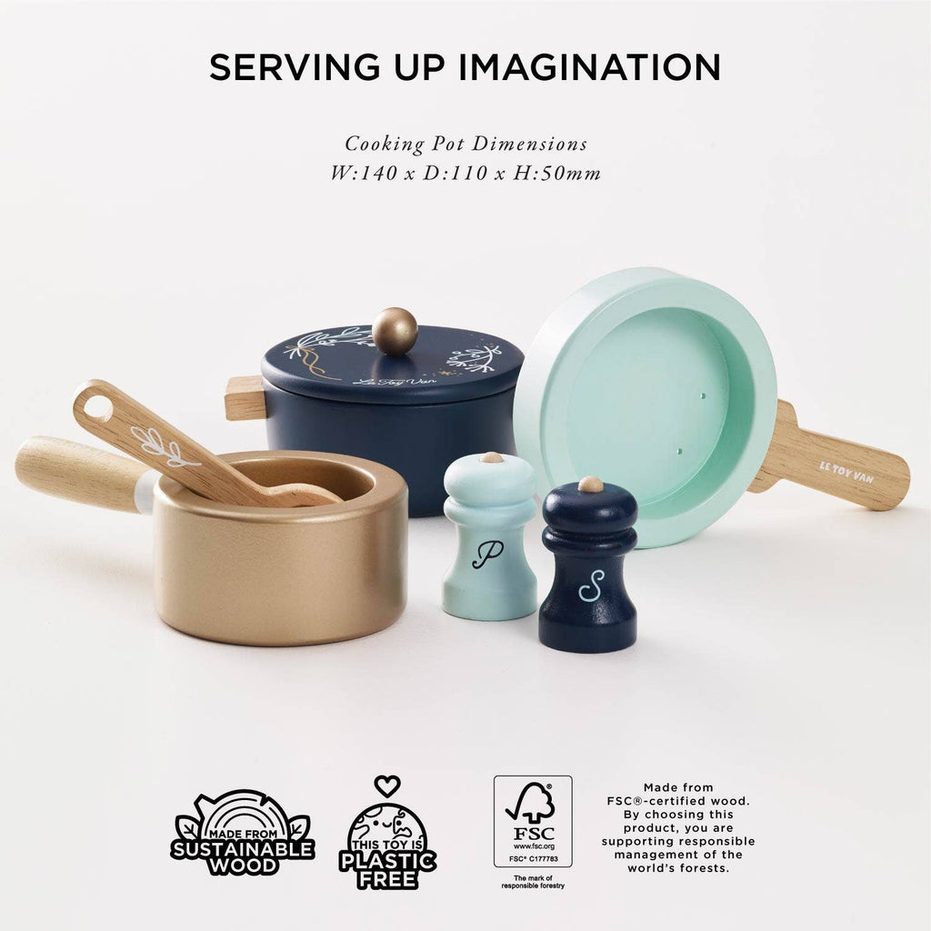 Pots & Pans Kitchen Accessories featuring a dark blue lidded pot, light blue pan, gold saucepan with a wooden spoon, and salt and pepper shakers, displayed with dimensions and sustainability labels.