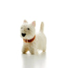 A small, fluffy felt model of a white Westie, standing isolated on a bright white background. The dog wears a tiny orange collar.