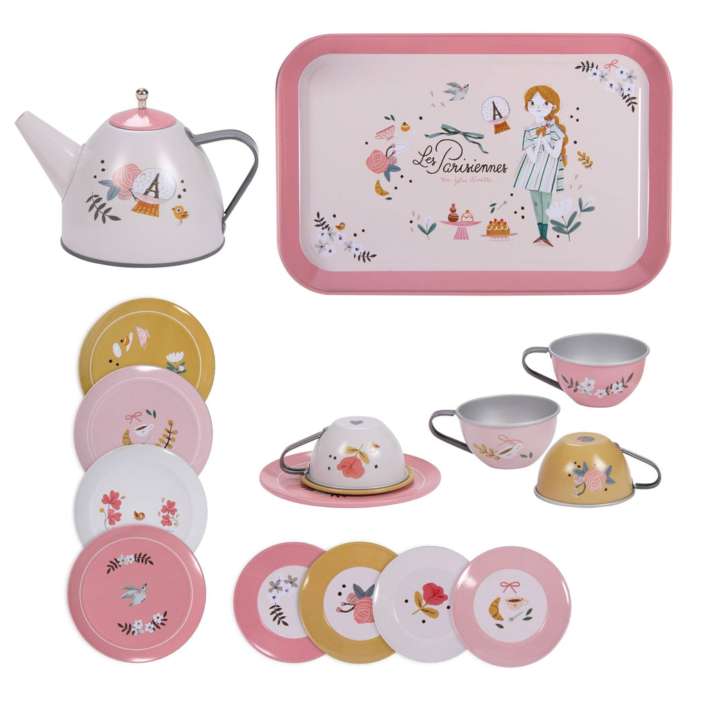 Moulin Roty Metal Tea Party Suitcase Set - The Parisiennes metal tea set for children, including a teapot, serving tray, four cups, and four saucers decorated with floral patterns and illustrations of a girl.