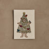 Coral & Tusk Christmas Tree Bear Card featuring an embroidered cotton bear wearing a Christmas tree costume decorated with ornaments, birds, and a gold star.