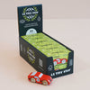 A No. 4 GT25 Finley red wooden racing car sits in front of an open display box containing multiple small green packages labeled “Le Toy Van.” The box promotes “Limited Edition” vintage-inspired toy cars made in England, with “50 to collect.”.