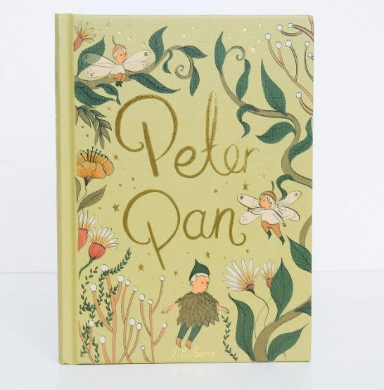 The image showcases the "Peter Pan | Barrie | Collector's Edition | Hardcover Book" with gold script title, a light green cover featuring fairy, flower, and leaf illustrations, and a small figure in green. It's a tribute to J.M. Barrie's enchanting world, including Captain Hook.