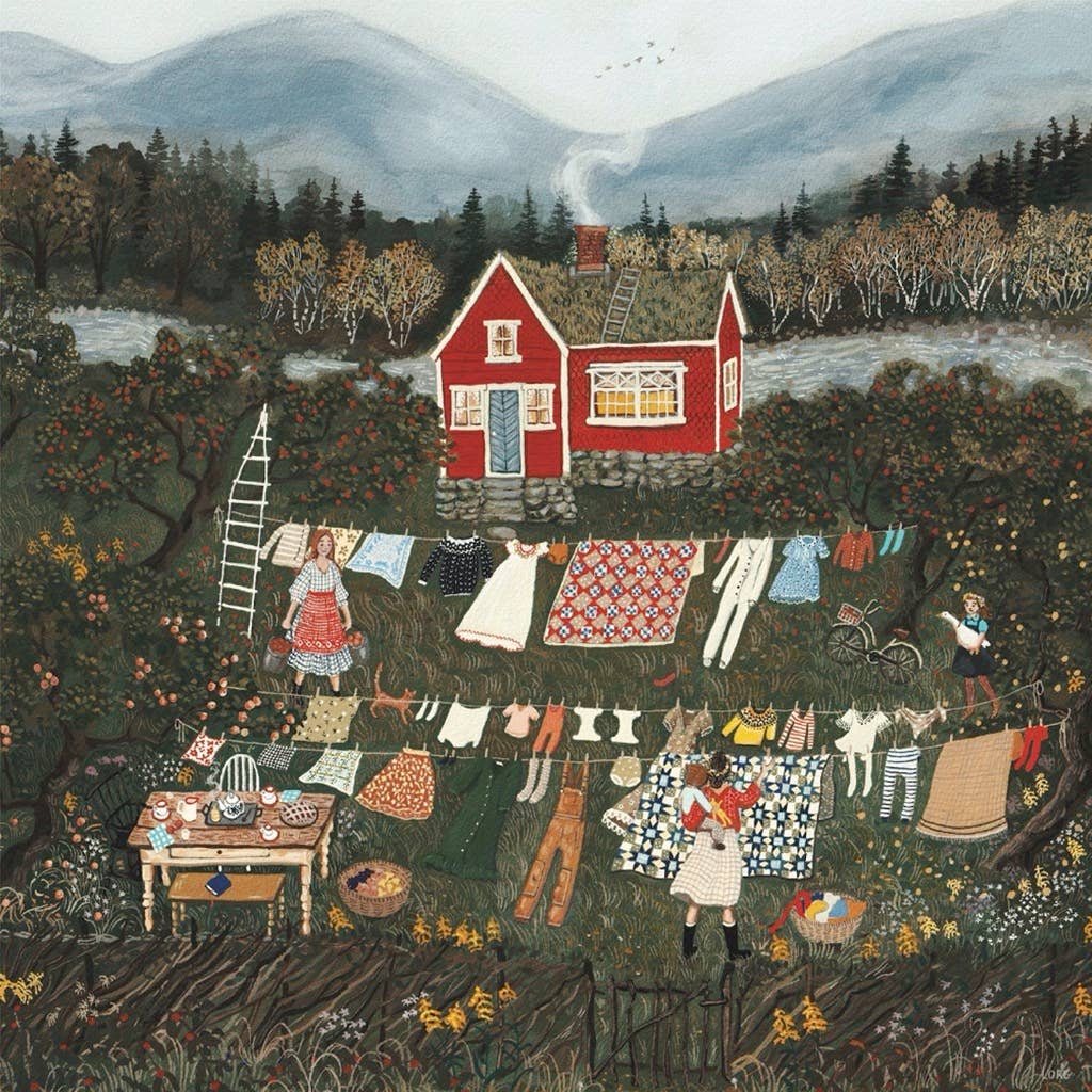 A red cottage in the countryside with laundry, two women, a child at play, and pets—just like At Brambly Hedge - 500 Piece Jigsaw Puzzle—set among trees and mountains beneath a cloudy sky.