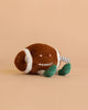 The Mon Ami - Freddie Football Plush Toy, featuring a smiling face, striped arms, and green feet, sits on a plain beige background—making it an adorable cuddle companion or a delightful gift for kids.