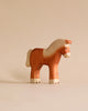 The Handmade Holzwald Shepherd with Farm Animals Set features charming, sustainably crafted wooden figures with natural finishes, perfect for imaginative play and eco-friendly toy collections.