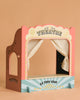 The Maileg Family Theater Set is a vibrant wooden puppet theater with white curtains and a side ticket booth—ideal for showcasing your Maileg mice or as the centerpiece in your Maileg dollhouse furniture collection.
