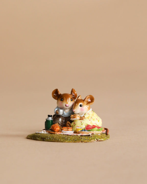 The Wee Forest Folk Tiny Collectible—Just the Two of Us (Not a Toy)—features two small, hand-sculpted mice sitting together on a picnic blanket with miniature food and drink, set against a plain beige background.