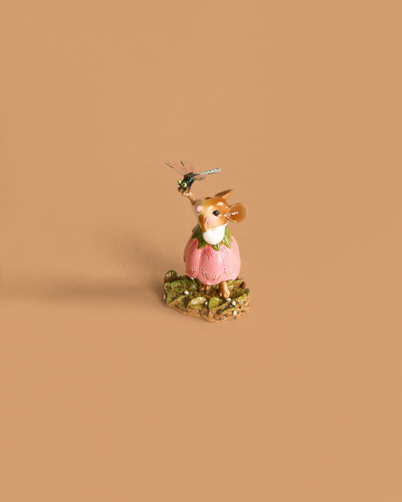 Wee Forest Folk Tiny Collectible - Pretty Perch in Pink features a hand-sculpted mouse in a pink dress on a green base, holding a dragonfly-topped staff against a plain beige background.