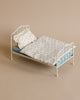 Toy blue doll bed