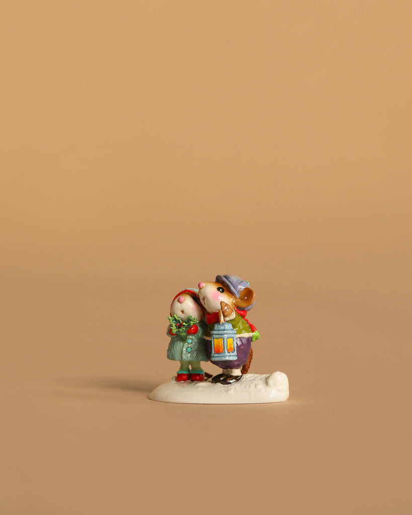 The Wee Forest Folk Tiny Collectible - The Little Wanderers (Not A Toy) features a hand-sculpted child and mouse in winter outfits standing together on a white base, perfect for collectors.