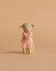 A Maileg Easter Egg with Lamb & Extra Clothing features a micro lamb stuffed animal dressed in textured pink attire, sitting upright against a plain beige background.