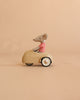A Maileg LouiMax and Stella Adventure Set, featuring a plush LouiMax mouse in a red striped shirt seated in a small beige car, is displayed against a plain beige background.