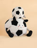 Two Mon Ami Sergio Soccer Ball plush toys with smiling faces, rosy cheeks, striped arms and legs, and black feet are sitting against a plain beige background—a perfect soccer gift for any fan.