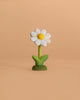 A charming, stylized model from the Bumbu Handmade Wooden Swan Set stands upright against a plain beige background, evoking the appeal of handmade wooden toys with its elegant design and natural finish.