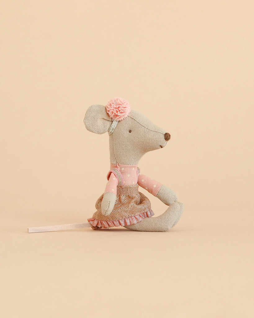 Maileg Grandma’s Hug is a stuffed toy mouse in a pink polka-dot top, metallic skirt, and pink pom-pom—perfectly sized to perch on a Little Sister Maileg Folding Chair.