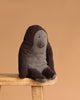 The Maileg Gorilla, Medium features soft fabric, dark brown arms, and a light gray face and belly. It’s perfect for your Safari friends collection or as a charming accent on any shelf or stool.