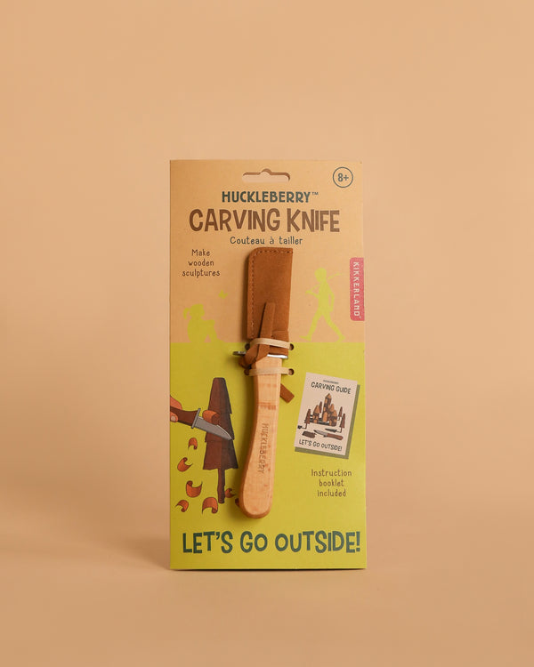 The Huckleberry Carving Knife (Not a Toy) is designed for ages 8+, featuring a beechwood handle, safety cover, carving guide, and packaging that says “LET’S GO OUTSIDE!” Includes easy-to-follow instructions.