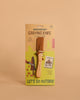 The Huckleberry Carving Knife (Not a Toy) is designed for ages 8+, featuring a beechwood handle, safety cover, carving guide, and packaging that says “LET’S GO OUTSIDE!” Includes easy-to-follow instructions.