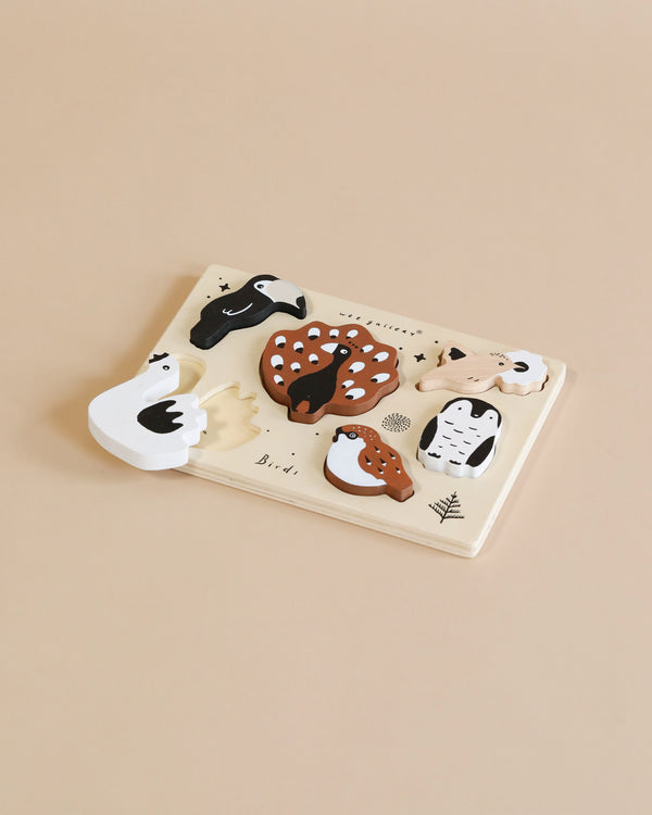 Wooden puzzle with bird shapes