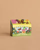 The Magical Minds Garden Kit - Butterfly Story Garden is a vibrant kids’ gardening kit with butterfly illustrations and bright flowers on green, playful scalloped yellow edges, and garden-themed art—perfect for a STEM DIY activity.