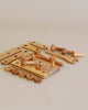 Handmade Wooden Building Tool Set featuring screws, nuts, and wrenches on a beige background, designed to simulate a miniature workshop setting for children 3 and up.