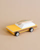 wooden car toy with surfboard