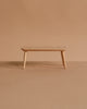Small wooden coffee table from the Maileg Christmas Tea With Grandma Set, featuring four tapered legs.