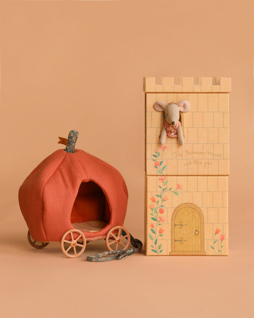 The Maileg Princess Fairytale Set includes a toy carriage and castle, perfect for taking your Maileg mouse on enchanting adventures.