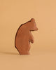 The Ostheimer Handmade Wooden Bear Set features upright, minimally detailed wooden bear figures with simple, abstract designs, inspired by classic Ostheimer toys and perfect for display on any flat surface.
