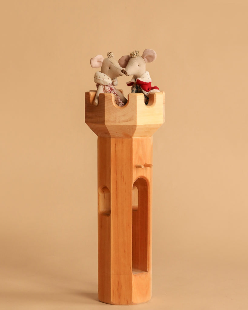 The Maileg Royal Tower Set features the Queen and King Mouse, both wearing crowns, sitting together atop the tower against a plain beige background.