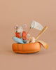 The Maileg Little Brother Gone Fishing Set features a small Beach Mouse in an orange life vest, sitting in a toy raft with fishing accessories—ideal for beach house play or expanding your Maileg mouse family, shown on a plain beige background.