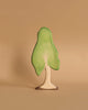 A large wooden birch tree with a light green canopy and a beige trunk. The Ostheimer Birch Tree, perfect for imaginative play, has a simplified and slightly whimsical design, standing upright against a plain white background.