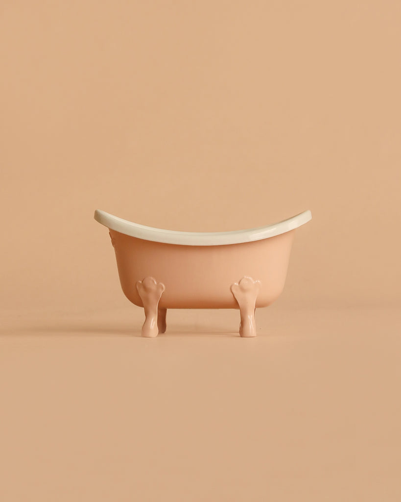 The Maileg Bathtub, Mouse - Rose features a small, vintage-style design and is shown from the side on a matching beige background.