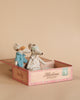 Two handmade Maileg Mum & Dad Mice in a Cigar Box bed. One mouse wears nightwear and the other a floral dress, both sitting in a "Havina Cigars" box against a