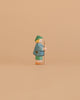 The Ostheimer Shepherd Boy is a small handcrafted wooden figurine featuring green and blue clothing and a green hat, holding a stick—ideal for imaginative play or as a charming addition to your Ostheimer toys collection.