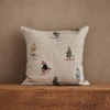 The Coral & Tusk Downhill Skiers Pillow features embroidered animals skiing on winding trails, creating a whimsical alpine scene on a beige background—an elegant accent for any room.