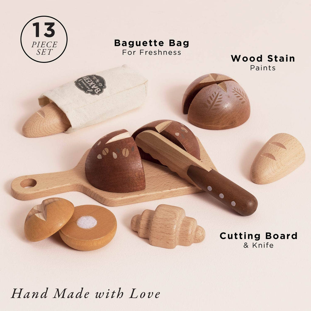 The Artisan Bread and Knife Set (ships in one week) is ideal for kitchen role play and includes 13 pieces: a baguette bag, painted wooden bread pieces, cutting board, knife, all neatly arranged with labeled descriptions.
