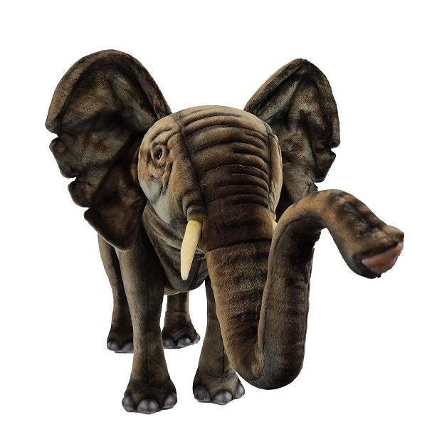 The Ride-On Elephant - Final Sale features brownish-gray fur, large floppy ears, white tusks, and an extended trunk, standing on all fours against a white background—perfect for any realistic animal toy collection.