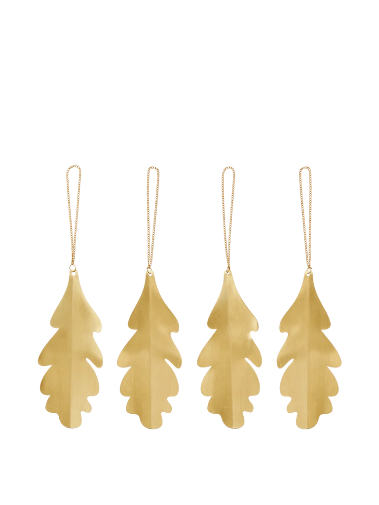 Four Ferm Living Oak Leaf Ornaments - Set of 4 - Brass, each crafted as a brass oak leaf hanging from a thin gold-colored chain.