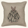 The Coral & Tusk Bat Wing Surprise Pillow is a beige throw pillow embroidered with a smiling bat wrapping its wings around itself, adding cozy bat plush charm to your space.