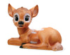 The Resin Deer Lamp is an adorable, animated deer fawn with large, expressive eyes lying in a relaxed position. It features a light brown coat with darker brown accents, a small black nose, and slightly larger ears. Perfect for nursery decor or as an LED night light, the lamp image comes against a white background.